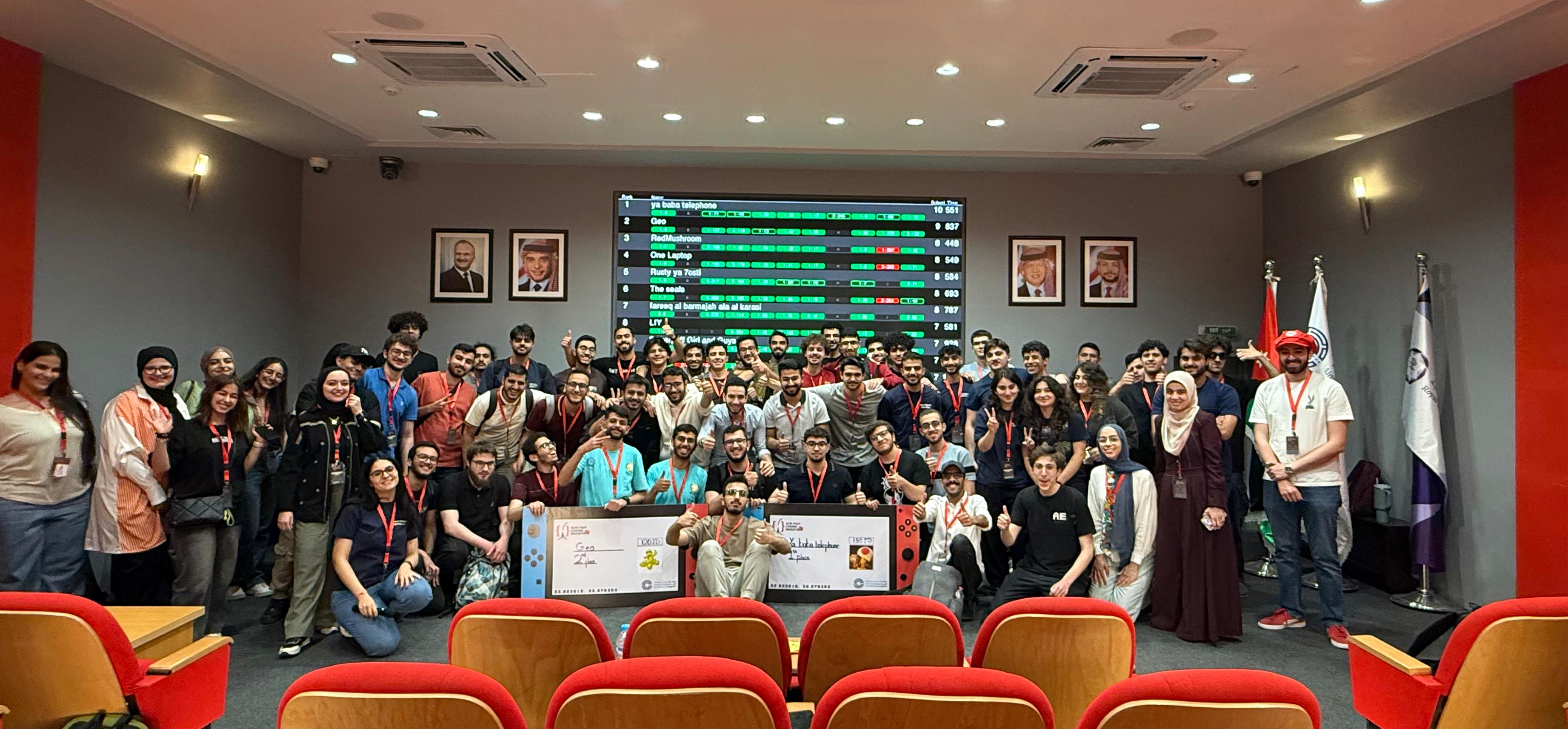Marathon participants posing with the winners' cheque